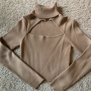 Cropped turtleneck with front cutout